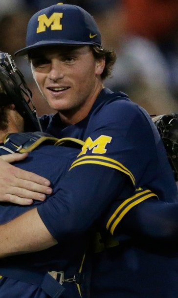 Michigan rides Tommy Henry's 3-hitter to 2-0 win over Florida State at CWS